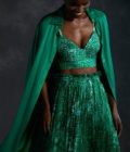 Polka printed green bustier with high waisted skirt & Coat