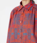 Abstract print collared shirt with micropleated skirt